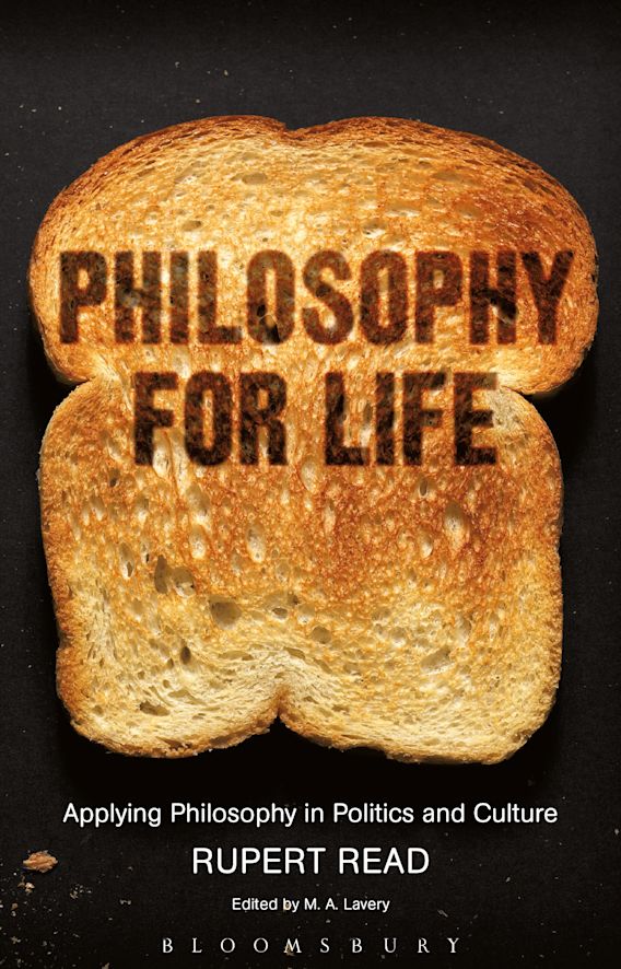 Book cover of Philosophy For Life. Features a slice of toast overlaid with the title against a black background.