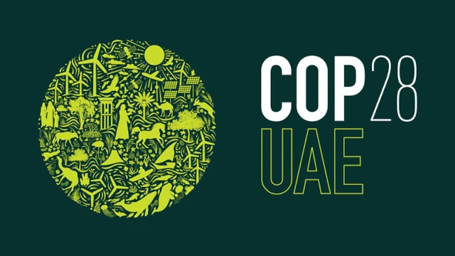The logo for COP 28, featuring a circle made of line drawings. Among others, there are line drawings of windmills, solar panels and a plane.