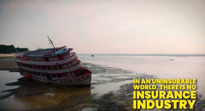 An image showing a boat stranded on a sandy bank, leaning to the side, water has gone out. Text in bottom right hand corner says 'In an uninsurable world, there is no insurance industry'.